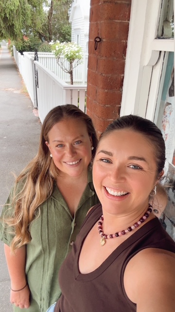 The two founders of The ReLoved Collective standing together on a Ballarat verandah
