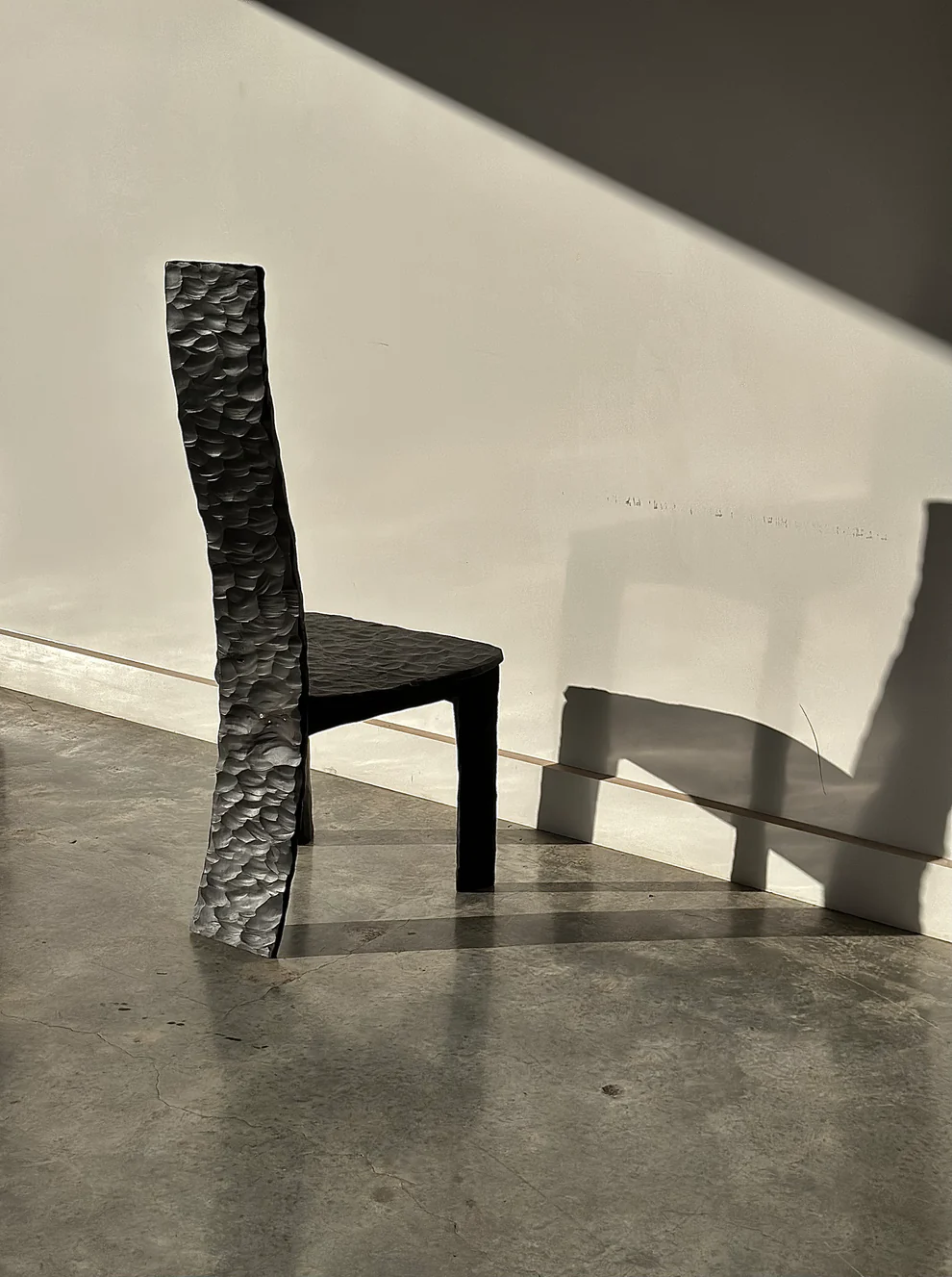 Taila Danae sculptural black ceramic chair